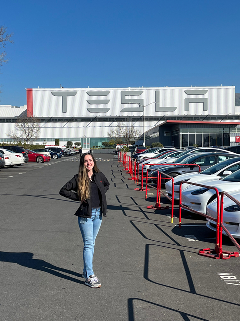 Alexis Gasparetti in front of Tesla